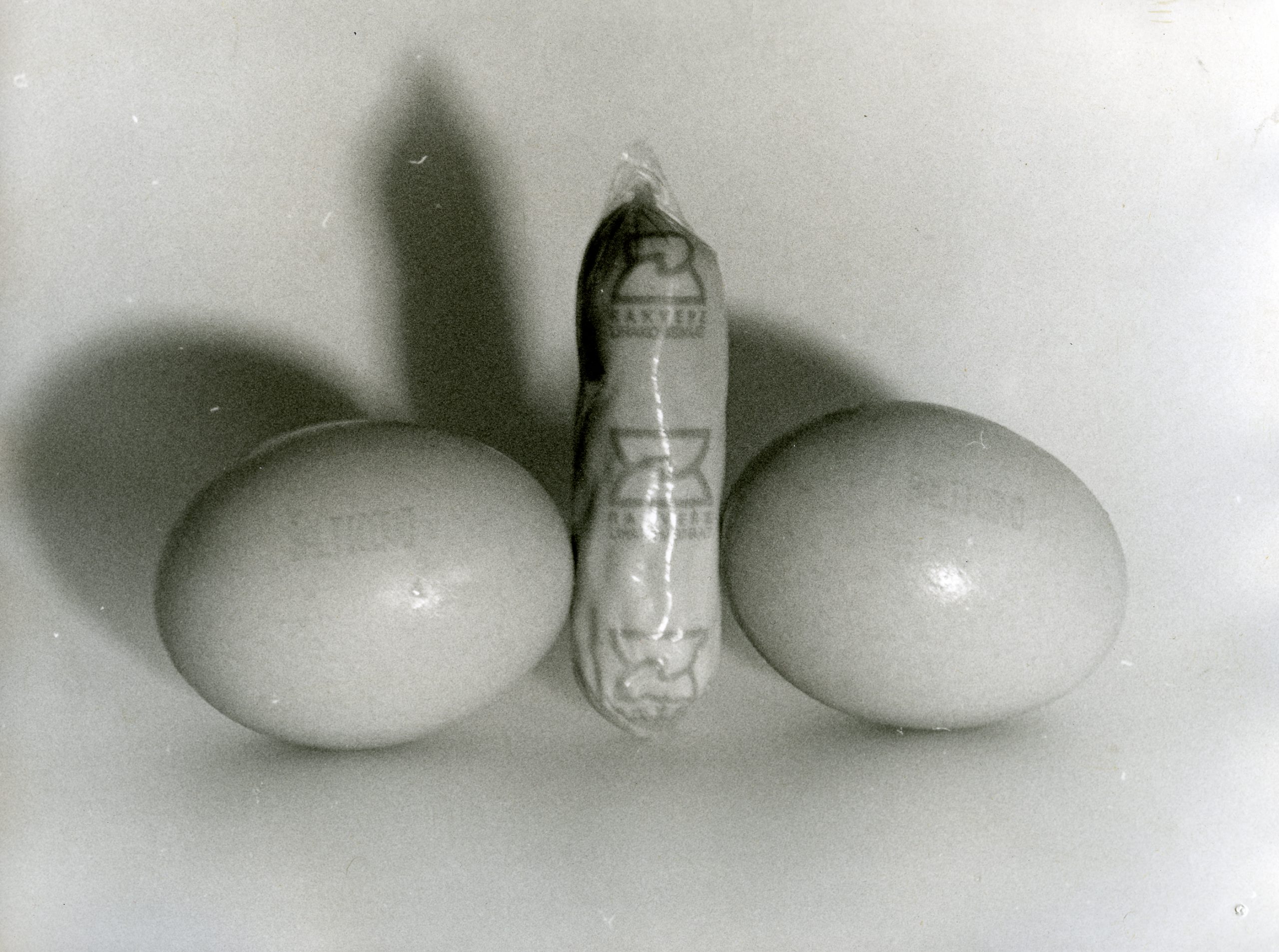 12_Erotic composition with two eggs and sausage, b&w photograph, 1997